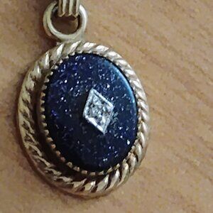 14K Gold Pendant with Sunstone & a small dimond